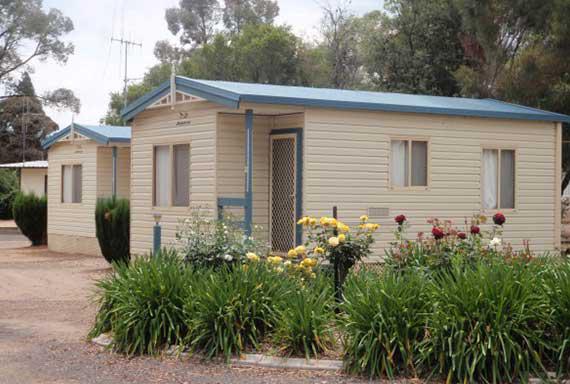 cream coloured cabins in a row