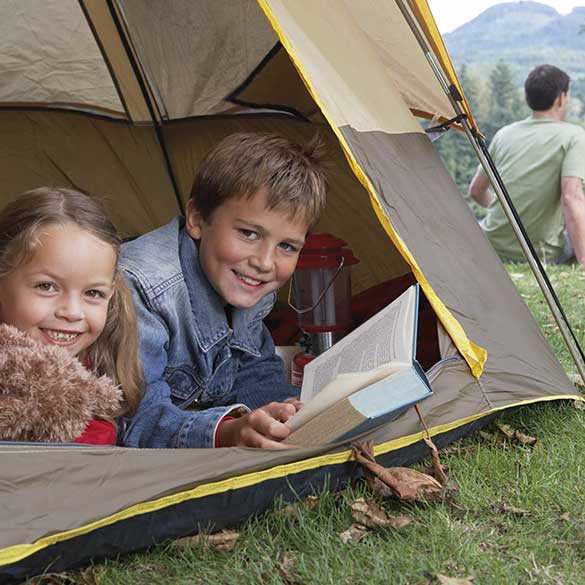 two children in a tent