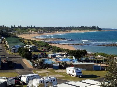 view of the park with beach stretching out behind