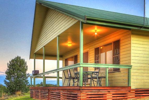 outside of yellow and green cabin