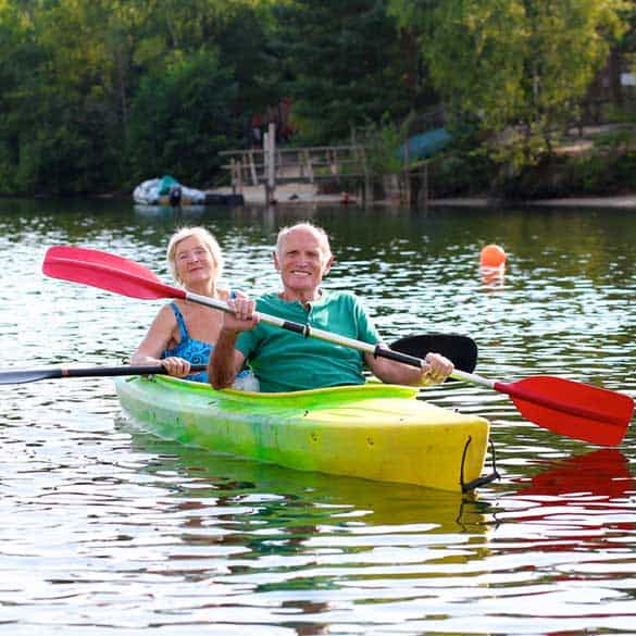 older couple kayaking