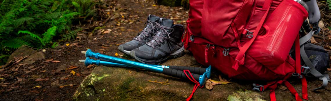 walking poles hiking shoes and back pack