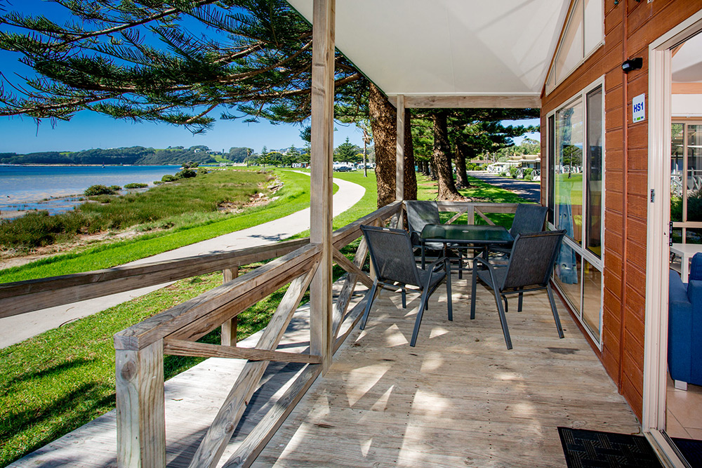 View from a cabin verandah looking at the beach