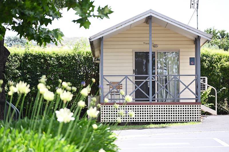 Exterior photo of a cabin at Colour City Caravan Park